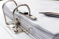 Pen on file folder with documents, storage of contracts. selecti Royalty Free Stock Photo