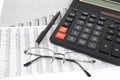 Pen, glasses and calculator Royalty Free Stock Photo