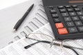 Pen, glasses and calculator Royalty Free Stock Photo