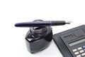 Pen, ink and calculator isolated Royalty Free Stock Photo