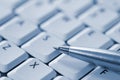 Pen on Keyboard Royalty Free Stock Photo