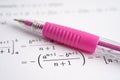 Pen on mathematic formula exercise test paper in education school Royalty Free Stock Photo