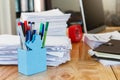 Pen with notebook and documents on wooden table in home office. Royalty Free Stock Photo