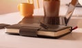 Pen and notebook with laptop.Inspiration moment,workspace or coffee break in the morning selective focus Royalty Free Stock Photo