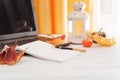 Pen, notebook, laptop, pumpkin, leaves, candle on a white table, autumn Royalty Free Stock Photo