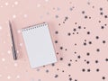 Pen and notebook with scattered stars and circles on a delicate pink background . 3D rendering Royalty Free Stock Photo