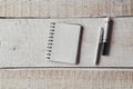 Pen and notepad on office wooden table Royalty Free Stock Photo