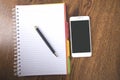 Pen with notepad and smart phone Royalty Free Stock Photo