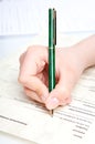 Pen over document Royalty Free Stock Photo