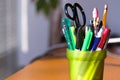 Pen and Pencil Holder on Desk Royalty Free Stock Photo