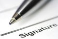 Pen for signature on paper Royalty Free Stock Photo