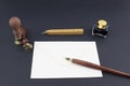 Pen, stamp, envelope, ink pot and wax Royalty Free Stock Photo