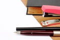 Pen and stapler