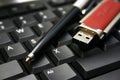 Pen, USB stick and keyboard Royalty Free Stock Photo