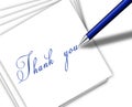 Pen writing thank you on the paper Royalty Free Stock Photo