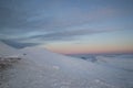 Pen y Fan mountain summit at sunset in winter Royalty Free Stock Photo