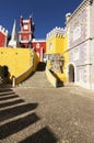 SINTRA, PORTUGAL - JULY, 06, 2019: The Arches Yard, chapel and clock tower of Palacio da Pena, Sintra, Portugal.