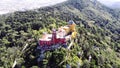 The Pena Palace, a Romanticist castle in the municipality of Sintra, Portugal, Lisbon district, Grande Lisboa, aerial view, shot Royalty Free Stock Photo