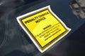 Penalty charge notice parking fine attached to windscreen Royalty Free Stock Photo