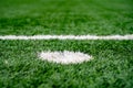 Penalty point on artificial grass football pitch Royalty Free Stock Photo