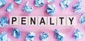 PENALTY word made with building blocks on pink background Royalty Free Stock Photo