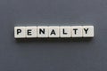 Penalty word made of square letter word on grey background.