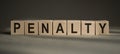 PENALTY word made up of building blocks on gray background Royalty Free Stock Photo