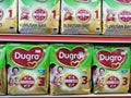 Penampang, Sabah Malaysia-10 March 2021. Dugro formula powder milk display on shelf at the supermarket.