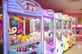 Penang, Malaysia - April 7, 2023 : An assortment of claw game machines inside at shopping mall