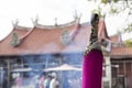 PENANG, MALAYSIA, December 19 2017: Giant pink joss sticks burning Royalty Free Stock Photo