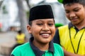 Penang, Malaysia 10 12 2018: Happy boy in a traditional Muslim cap smiling