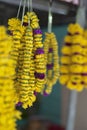 Colourful yellow and purple colors flowers and garlands for sale at the little India street, butterworth, Penang. Royalty Free Stock Photo