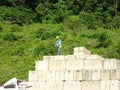 Construction workers stacking the maintain load test block also known as MLT test at the construction site. Royalty Free Stock Photo