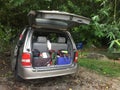 Penang, Malaysia - June 10, 2020 : A car with the back door open showing camping gears at a camp site at Penang Hill Royalty Free Stock Photo