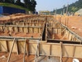 Building ground beam under construction at the site using timber plywood as the formwork.