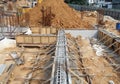 Building ground beam under construction at the site using timber plywood as the formwork.