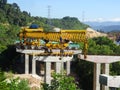 Overhead road under construction. The massive concrete column used to support the concrete road deck.