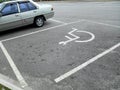 Parking for the disabled. The parking lot has a blue background and has a special logo.