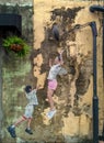 Street Mural tittle `Children Playing Basketball` painted by Louis Gan in Penang on July 6, 2013. It was painted in conjunction