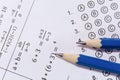 Pencil on answer sheets or Standardized test form with answers bubbled. multiple choice answer sheet Royalty Free Stock Photo