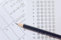 Pencil on answer sheets or Standardized test form with answers bubbled. multiple choice answer sheet Royalty Free Stock Photo