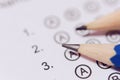 Pencil on answer sheets or Standardized test form with answers bubbled. multiple choice answer sheet Royalty Free Stock Photo