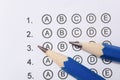 Pencil on answer sheets or Standardized test form with answers bubbled. multiple choice answer sheet Royalty Free Stock Photo