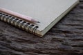 Pencil and book mockup on the old wood desk at the background Royalty Free Stock Photo