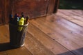 Pencil box full of pencil and scissors on the wooden floor Royalty Free Stock Photo