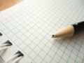 Pencil with broken tip on blank paper; disappointment Royalty Free Stock Photo