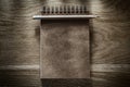 Pencil brown notepad on wooden board