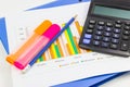 Pencil, calculator, Blue file, graph sheet, Color highlight pen on white background isolated Royalty Free Stock Photo