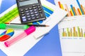 Pencil, calculator, Blue file, graph sheet, Color highlight pen on white background isolated Royalty Free Stock Photo