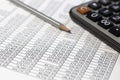 Pencil and calculator on desk table with financial account documents Royalty Free Stock Photo